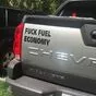 На фото наклейка Fuck Fuel Economy в черном цвете, размером 30 х 15 см